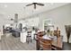 Open-concept kitchen featuring a large island, modern appliances, and dining area at 2818 N 19Th St, Tampa, FL 33605