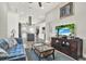 Open-concept living room flowing into a modern kitchen, with stylish furnishings and decor at 2818 N 19Th St, Tampa, FL 33605