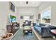 Bright living room featuring stylish furniture, modern decor, and an open layout at 2818 N 19Th St, Tampa, FL 33605
