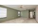 Bedroom featuring a ceiling fan, neutral walls and carpet, plus a window at 2932 Sweetgum S Way, Clearwater, FL 33761
