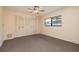 Bedroom featuring a large closet with louvered doors and a window at 2932 Sweetgum S Way, Clearwater, FL 33761