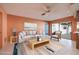 Living room with furniture and adjacent dining area at 2932 Sweetgum S Way, Clearwater, FL 33761