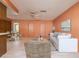 Living room with adjacent dining area at 2932 Sweetgum S Way, Clearwater, FL 33761