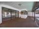 A patio area features sliding doors for easy access to the outdoor pool at 2932 Sweetgum S Way, Clearwater, FL 33761