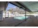 Outdoor pool area enclosed with a screened-in lanai for enjoying the Florida sunshine at 2932 Sweetgum S Way, Clearwater, FL 33761