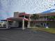 Community clubhouse exterior featuring covered entrance, and an American flag at 2960 59Th S St # 102, Gulfport, FL 33707