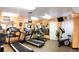 Community gym area with treadmills, elliptical, and exercise equipment for residents to use at 2960 59Th S St # 102, Gulfport, FL 33707