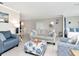 Inviting living room features tile floors, neutral tones and comfortable seating arrangements at 2960 59Th S St # 102, Gulfport, FL 33707