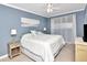 Serene main bedroom boasts a calming color scheme, soft lighting, and comfortable furnishings at 2960 59Th S St # 102, Gulfport, FL 33707