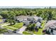 Spacious two-story home with an attached garage and lush, green landscaping at 3211 Grassglen Pl, Wesley Chapel, FL 33544