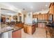 Beautiful kitchen featuring granite countertops, stainless steel appliances and a functional island at 3211 Grassglen Pl, Wesley Chapel, FL 33544