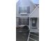 Charming home featuring gray paint, black shutters, and well kept landscaping at 3321 Laurel View Dr, Brandon, FL 33511