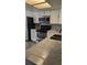 Bright kitchen with updated appliances, white cabinets, and stylish countertops at 3321 Laurel View Dr, Brandon, FL 33511