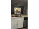 Open concept kitchen with stainless steel sink and appliances overlooking the living area at 3321 Laurel View Dr, Brandon, FL 33511