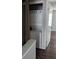 Convenient laundry area with stacked washer and dryer unit at 3321 Laurel View Dr, Brandon, FL 33511