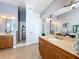 Spacious bathroom with a double vanity, soaking tub, and a walk-in shower at 362 Coquina Dr, Tarpon Springs, FL 34689