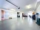 Oversized, well-lit garage, offering plenty of space for parking and storage at 362 Coquina Dr, Tarpon Springs, FL 34689