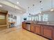Spacious kitchen featuring granite countertops, stainless steel appliances, and open layout at 362 Coquina Dr, Tarpon Springs, FL 34689