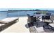 Inviting outdoor patio with comfortable seating, perfect for enjoying waterfront views at 362 Coquina Dr, Tarpon Springs, FL 34689