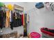 Walk-in closet with ample storage space, including shelving and hanging racks for clothes and accessories at 36734 Goffaux Loop, Zephyrhills, FL 33541