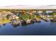 A lake side home with a well-manicured lawn, private dock and easy access to the lake at 3829 Eagleflight Ln, Land O Lakes, FL 34639