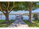 Scenic view of a private boat dock, offering a peaceful retreat and easy access to the water at 3829 Eagleflight Ln, Land O Lakes, FL 34639