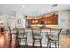 Kitchen with stainless steel appliances, granite counters, and seating at the breakfast bar at 3829 Eagleflight Ln, Land O Lakes, FL 34639