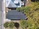 Aerial shot revealing the dark roof of a home with mature landscaping at 412 E Columbus Dr, Tampa, FL 33602