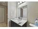 Clean bathroom showcasing vanity sink, black faucet, and neutral wall color at 412 E Columbus Dr, Tampa, FL 33602