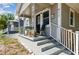 Cozy front porch with a seating area and a view of the neighborhood at 412 E Columbus Dr, Tampa, FL 33602