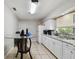 Bright kitchen with white appliances, ample counter space, and natural light at 412 E Columbus Dr, Tampa, FL 33602