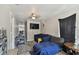 Cozy living room featuring a ceiling fan and a comfortable gray couch at 412 E Columbus Dr, Tampa, FL 33602