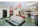 Spacious clubhouse with comfortable seating, a pool table, and ample room for social gatherings and community events at 4242 Sheldon Pl, New Port Richey, FL 34652