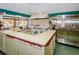 A communal kitchen space with modern appliances, counter space, and food prep area at 4242 Sheldon Pl, New Port Richey, FL 34652