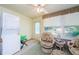 A practical laundry area featuring a stacked washer and dryer, with a window offering natural light and ventilation at 4242 Sheldon Pl, New Port Richey, FL 34652