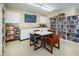 The community library features bookshelves filled with books, magazines, and a television at 4242 Sheldon Pl, New Port Richey, FL 34652