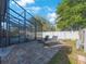 Relaxing screened-in pool area with pavers and lounge chairs for comfortable outdoor enjoyment at 4926 Cardinal Trl, Palm Harbor, FL 34683