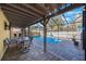 This screened-in pool is perfect for summer gatherings at 4926 Cardinal Trl, Palm Harbor, FL 34683
