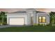 Charming single-Gathering home with a modern design, well-maintained lawn, and attached two-car garage at 4951 Ribbon Rock Cv, Lakewood Ranch, FL 34211