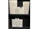 Interior design materials selections showcasing cabinets, countertops, tile, and flooring samples at 4951 Ribbon Rock Cv, Lakewood Ranch, FL 34211