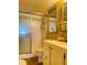 Bright bathroom featuring a vanity, sink, toilet, and tiled walk-in shower at 6020 Shore S Blvd # 903, Gulfport, FL 33707