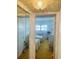 Bright bedroom with two twin beds, yellow carpet, and plenty of natural light at 6020 Shore S Blvd # 903, Gulfport, FL 33707