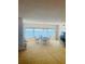 Bright dining area featuring large windows with water views, neutral tones and comfortable seating at 6020 Shore S Blvd # 903, Gulfport, FL 33707