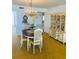 Dining space with chandelier, classic furnishings, and bright natural light at 6020 Shore S Blvd # 903, Gulfport, FL 33707