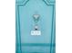 Close up of unit front door with classic hardware and aqua paint at 6020 Shore S Blvd # 903, Gulfport, FL 33707