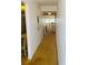 Hallway leading into condo showing carpet and view of the water in the distance at 6020 Shore S Blvd # 903, Gulfport, FL 33707