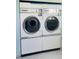 Bright laundry area features new side by side washer and dryer machines for your everyday laundry needs at 6020 Shore S Blvd # 903, Gulfport, FL 33707