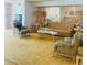 Cozy living room with carpet, traditional furniture, and ornate wall decor at 6020 Shore S Blvd # 903, Gulfport, FL 33707