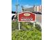Welcome to the Windsor sign with landscaping and palm trees at 6020 Shore S Blvd # 903, Gulfport, FL 33707