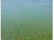 Vast, serene water view with a hint of land and buildings far off in the distance at 6020 Shore S Blvd # 903, Gulfport, FL 33707